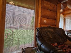 Istumisnurk majutusasutuses Log Haven