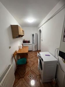 Kuchyň nebo kuchyňský kout v ubytování Alex