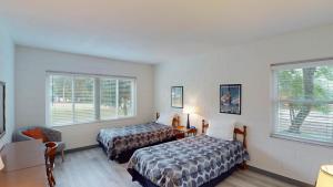 En eller flere senge i et værelse på Atlantic Breeze #1