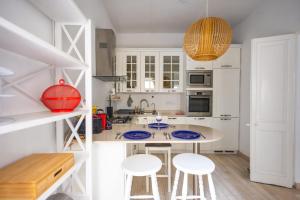 Η κουζίνα ή μικρή κουζίνα στο Sliema 1BR Townhouse Escape