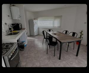 Η κουζίνα ή μικρή κουζίνα στο Perfect rest a few steps from the ocean