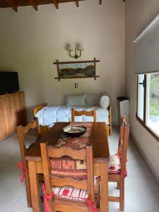 Postel nebo postele na pokoji v ubytování Estancia Don Jose- GuenGuel