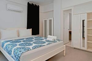 Ένα ή περισσότερα κρεβάτια σε δωμάτιο στο Beach Lounge Suites Punta Cana 1
