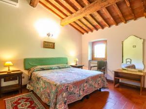 Voodi või voodid majutusasutuse Tuscan Apartment with Pool - Garden and Lake toas +7 fotot