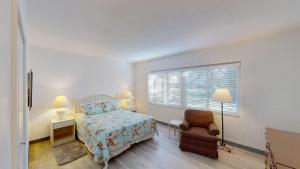 En eller flere senge i et værelse på Atlantic Breeze #2