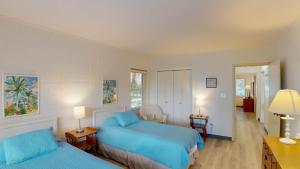 En eller flere senge i et værelse på Atlantic Breeze #5