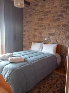 Ένα ή περισσότερα κρεβάτια σε δωμάτιο στο Sunset