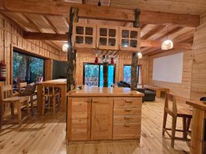 Φωτογραφία από το άλμπουμ του Casa Mágica en Bosque Huilo Huilo σε Neltume