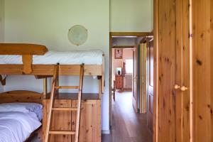 Postel nebo postele na pokoji v ubytování Bonetei 2