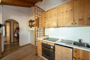 Η κουζίνα ή μικρή κουζίνα στο Casa Canazei