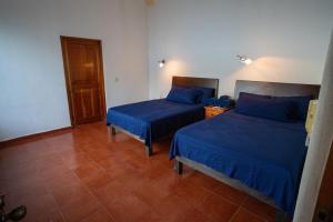 Postel nebo postele na pokoji v ubytování Casa Rubí comfortable and with a private pool + 120 fotografií