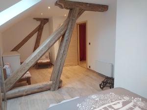 Ένα ή περισσότερα κρεβάτια σε δωμάτιο στο La Grange