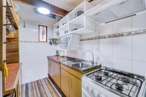 Η κουζίνα ή μικρή κουζίνα στο Cabaña Miramar 3D Wifi y Piscina +19 φωτογραφίες