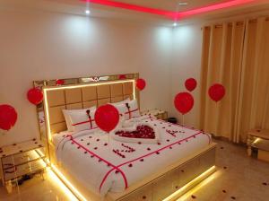 Postel nebo postele na pokoji v ubytování فندق نجمه الشمس