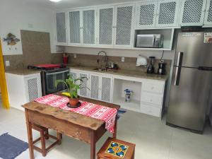 Kuchyň nebo kuchyňský kout v ubytování Linda casa na entrada do Centro Histórico