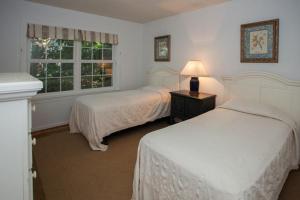 Voodi või voodid majutusasutuse Pelican House toas