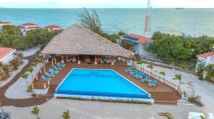 an aerial view of a resort with a swimming pool at Luxury All-Inclusive Prince Private Island in San Pedro Island