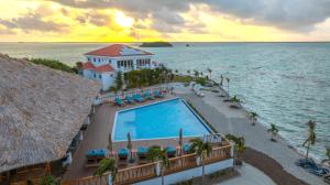 an aerial view of a resort with a swimming pool at Luxury All-Inclusive Prince Private Island in San Pedro Island