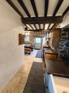 Posezení v ubytování Le cottage de Maddie - charme, calme et authenticité