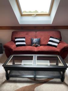 Posezení v ubytování Le Petit Mirabellier