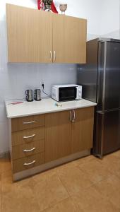 Kuchyň nebo kuchyňský kout v ubytování Guest House Morais