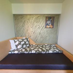 Postel nebo postele na pokoji v ubytování Yantra Tower Deluxe + 33 fotografií