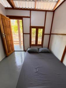 Postel nebo postele na pokoji v ubytování Modo homestay + 20 fotografií