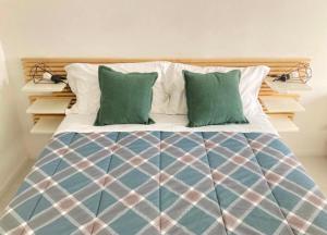 Ένα ή περισσότερα κρεβάτια σε δωμάτιο στο Dimora Porta Nuova - Sostify