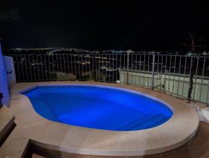 Bazén v ubytování Chalet con vistas al mar nebo v jeho okolí