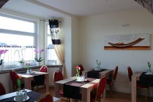 Ein Sitzbereich in der Unterkunft Pension Nordsee