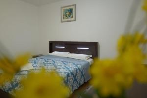 Ліжко або ліжка в номері Hotel Mina