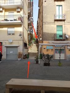 a red arrow points to a building in a city at Le Antiche Volte suite in Agropoli