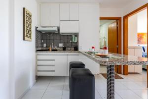 Køkken eller tekøkken på Premier 215 - LakeSide - Stúdio Amanhecer - Beira Lago - By Hospede Fácil