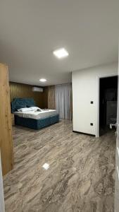 Ένα ή περισσότερα κρεβάτια σε δωμάτιο στο Motel i Restoran Krajina