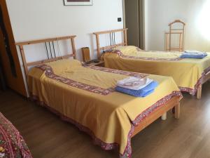 Postel nebo postele na pokoji v ubytování Al Cavallino Rosso + 10 fotografií