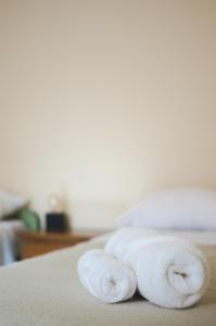 Ένα ή περισσότερα κρεβάτια σε δωμάτιο στο Lo de Sarita Hostería +10 φωτογραφίες