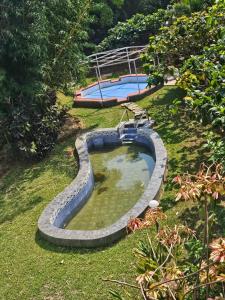 Πισίνα στο ή κοντά στο Valley Dew Village Stay