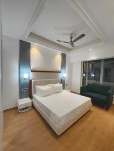 Ένα ή περισσότερα κρεβάτια σε δωμάτιο στο Hotel Pacific Primee +1 φωτογραφίες