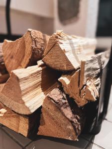 a pile of wood on top of a counter at Rinneköngäs - Ruka-Pyhä 2x SKIPASS included in Ruka