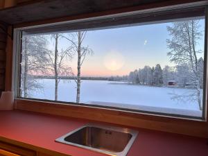 Fotografie z fotogalerie ubytování Aurora Lake Cabin v destinaci Korospohja