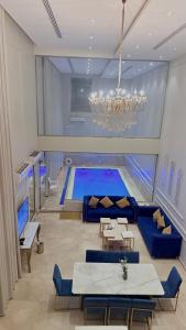 Bazén v ubytování شاليه رويال الخبر - Royal Resort AL Khobar nebo v jeho okolí