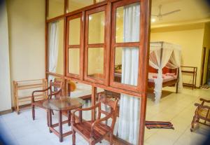 A bed or beds in a room at Hotel Finlanka