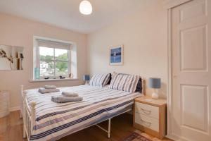 En eller flere senge i et værelse på Chandlers