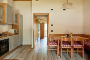 Kuchyň nebo kuchyňský kout v ubytování Bonetei 3 + 11 fotografií