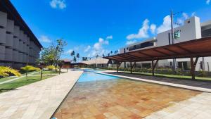 Bazén v ubytování Atlântico Carneiros - Pé na areia no melhor trecho da Praia dos Carneiros nebo v jeho okolí