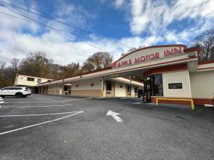 Budova, kde se penzion – hostinec nachází