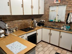 Kuchyň nebo kuchyňský kout v ubytování Valhalla + 7 fotografií