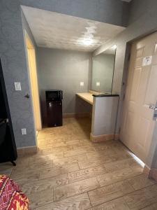 Kuchyň nebo kuchyňský kout v ubytování Apple Motel