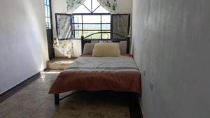 Postel nebo postele na pokoji v ubytování Hotel y Cabañas El Taxho + 148 fotografií