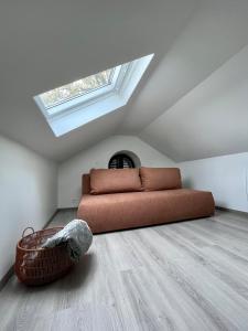 Ένα ή περισσότερα κρεβάτια σε δωμάτιο στο La Pomponnette